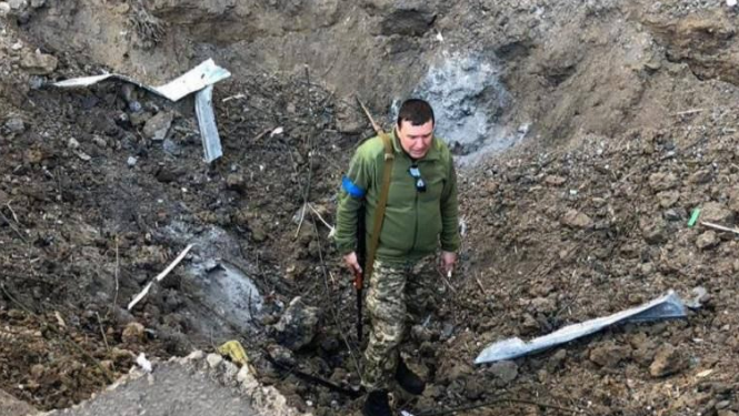 Воронка от упавшего снаряда